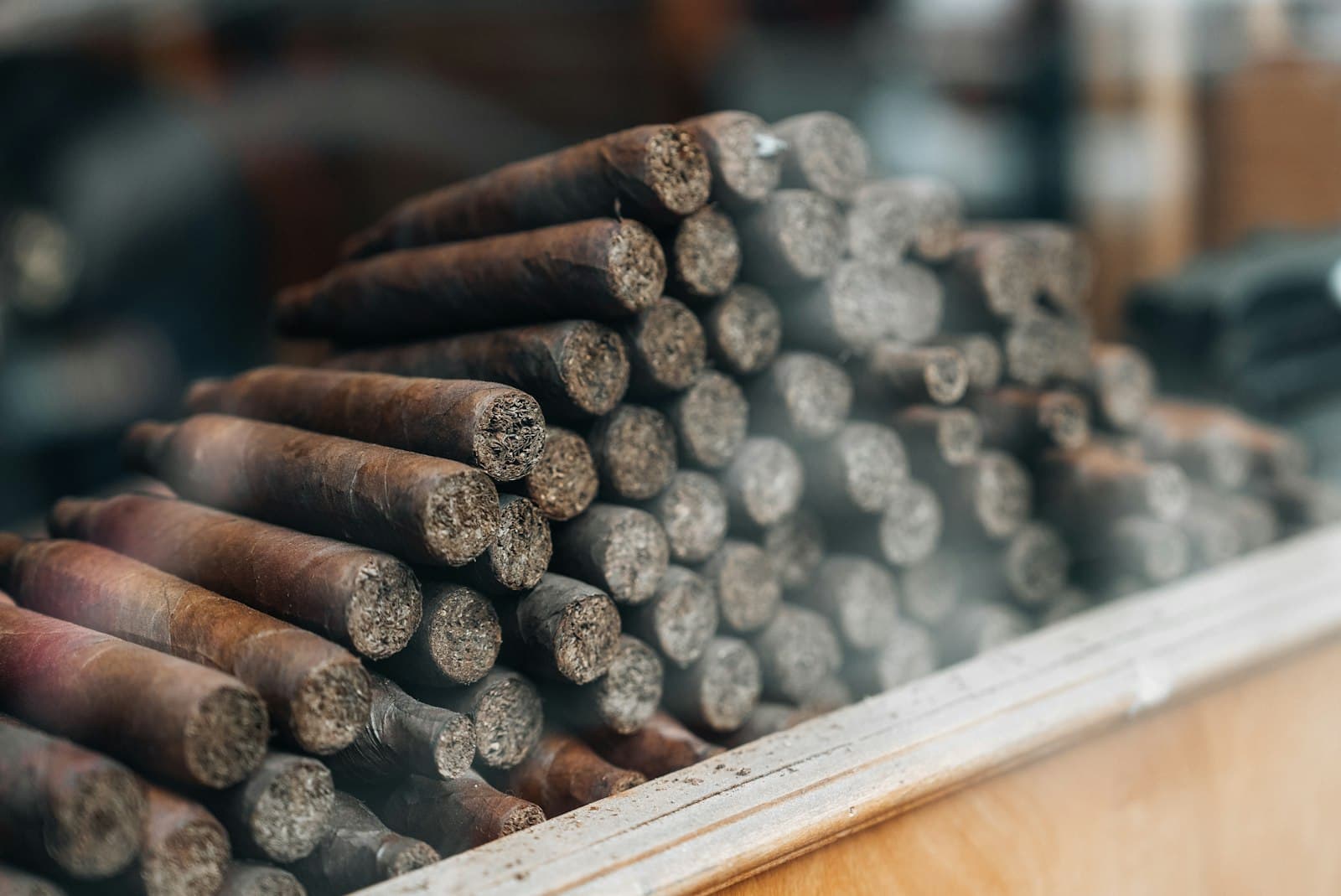 A close pile of cigars used as warm locker program mood
